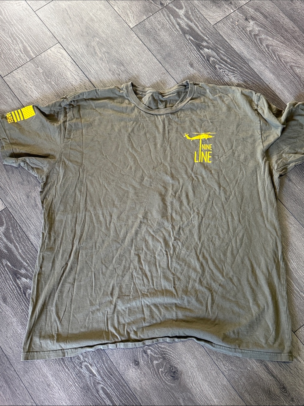 Nine Line Men’s Olive Green Short Sleeve Crew T-Shirt with Yellow Graphic